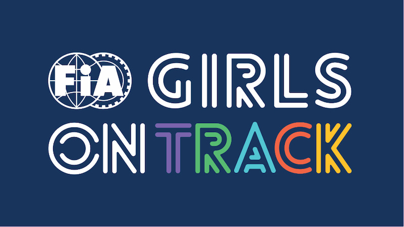 FIA Girls on Track-logotyp med färgglad text på mörkblå bakgrund.