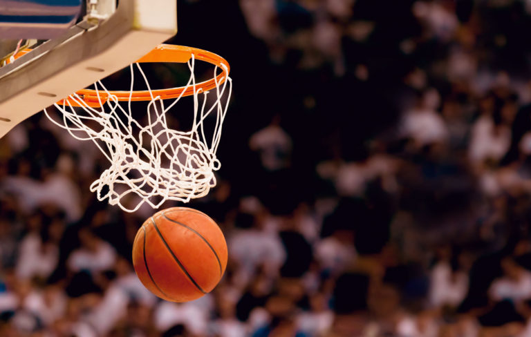 26735029 - scoring the winning points at a basketball game