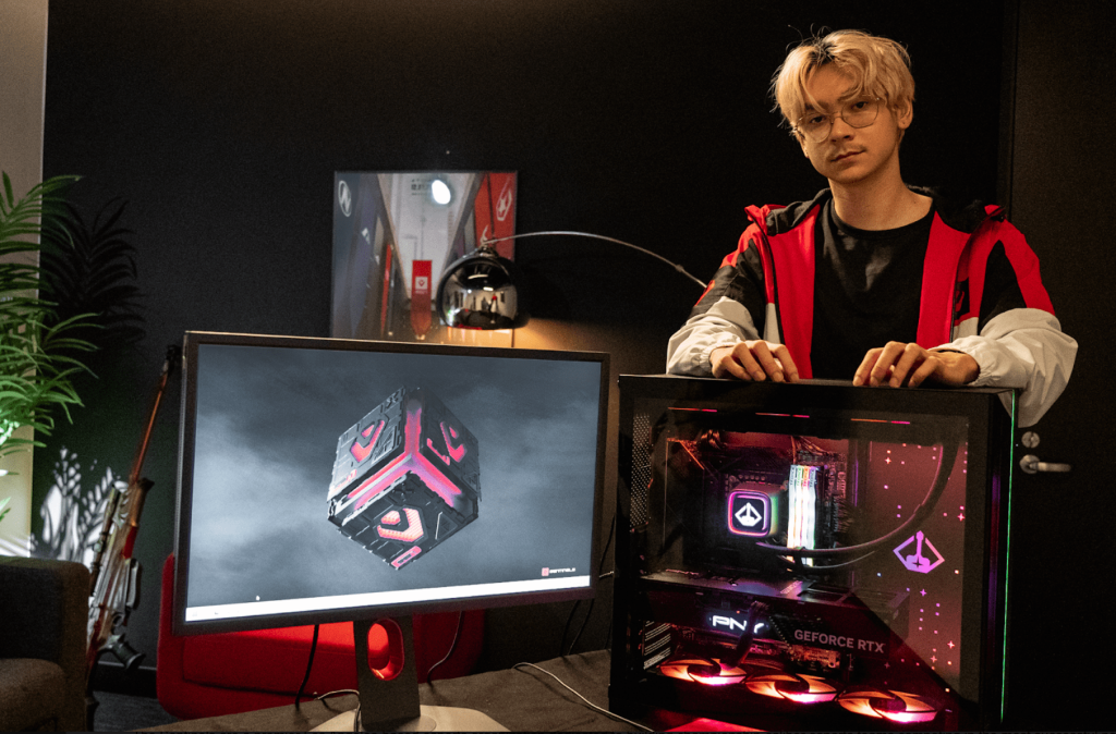 Sentinels star player TenZ stands next to a PC from STarforge Systems