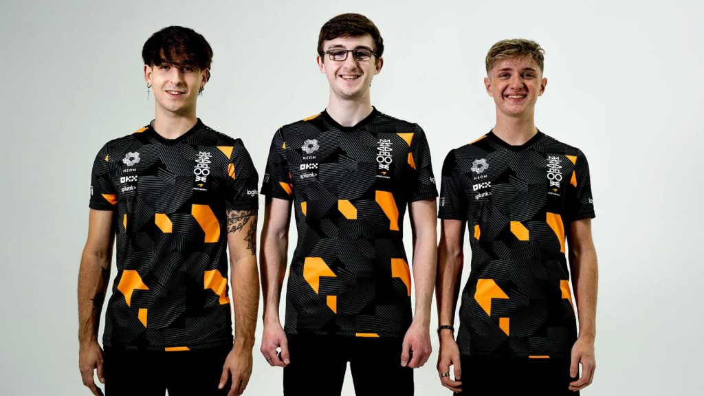 Image of McLaren Racing sim racing team wearing jerseys featuring NEOM logo