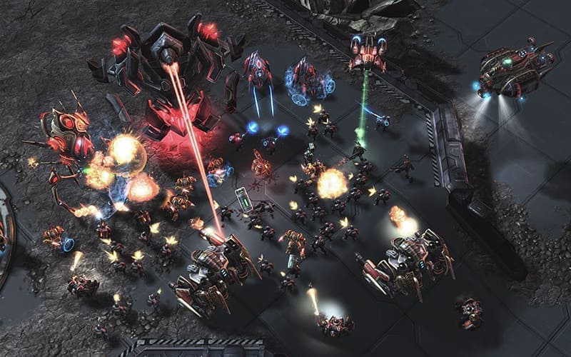 Aerial view of intense futuristic battle in a sci-fi setting, showcasing various robotic units and explosions in a space environment.