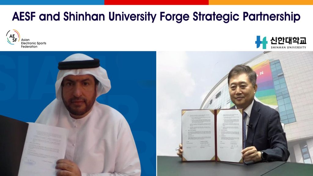 Asian Electronic Sports Federation and Shinhan University members holding a contract