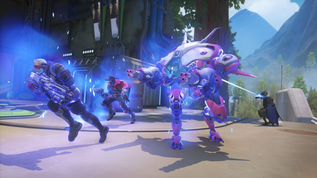 A futuristic scene features three armored characters in combat, with a large, colorful mech and vibrant blue energy effects in the background.