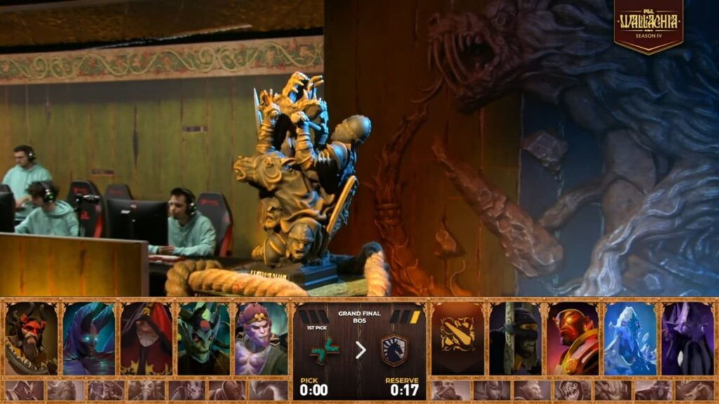 A decorative gaming setup showcases a golden statue and a wall mural with a fierce creature. Character selection is displayed below.