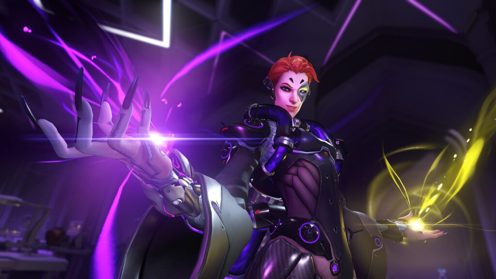 Moira from Overwatch 2 casting purple and yellow energy from her hands inside a futuristic lab environment
