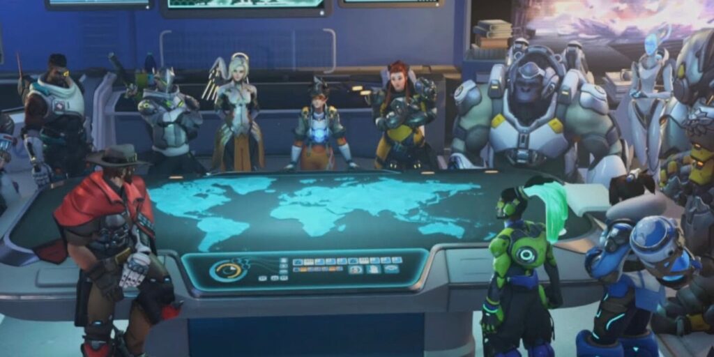 A diverse group of Overwatch heroes gathers around a holographic map table in a futuristic command center, engaged in discussion and strategy.