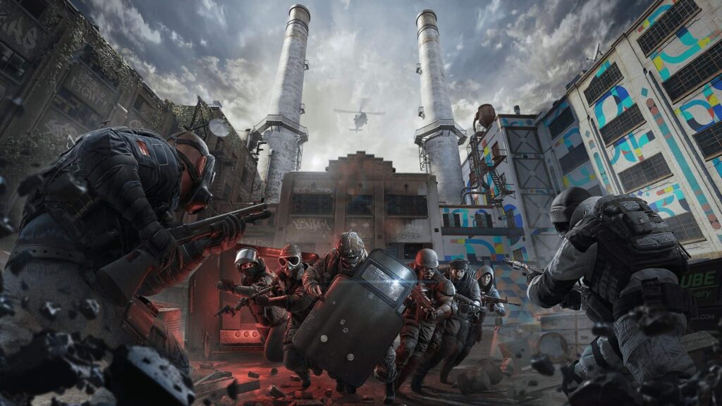 Two tactical teams clash in an urban warfare scene from Rainbow Six Siege, with operatives in full gear engaging in a firefight in front of a graffiti-covered industrial building