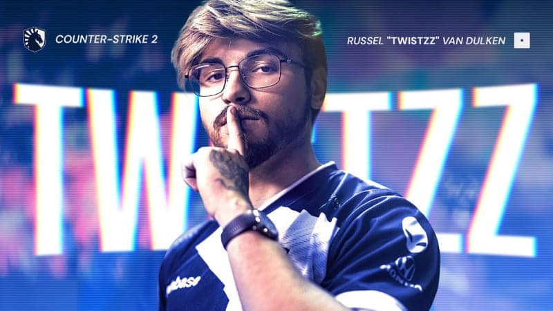 An esports player in a Team Liquid jersey poses confidently, with vibrant colors and the name "TWISTZZ" prominently displayed behind him.