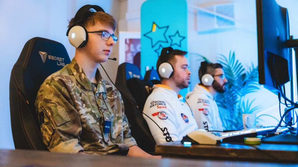 Image of UK armed forces members playing games.