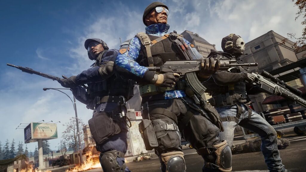 Image of Warzone players posing with guns. A multi-storey building is in the background