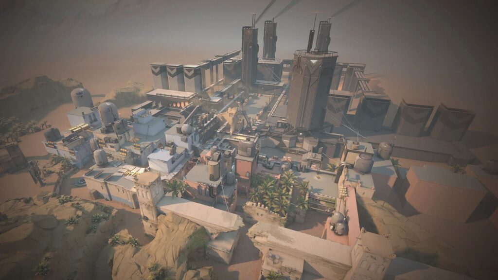 Aerial view of a futuristic, industrial desert settlement of a Bind map in VALORANT with tall structures, palmlined streets, and complex pathways.