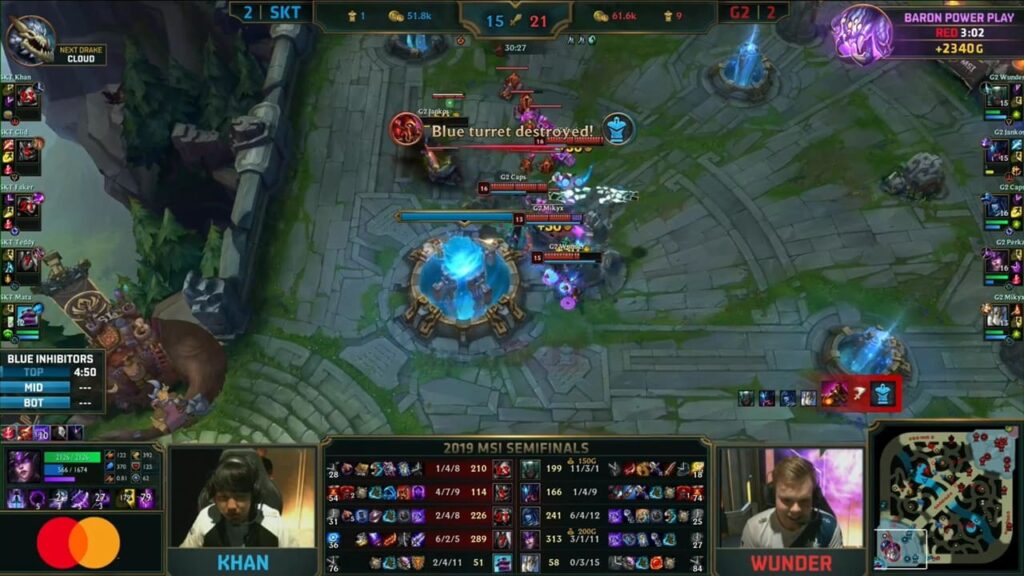 In a League of Legends match, G2 team aggressively destroys SKT's blue turret, showcasing the game's intense action.