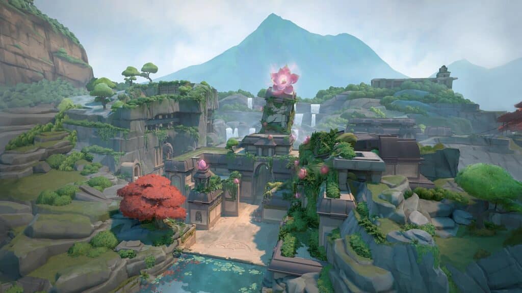 Lush, mystical landscape of a Lotus map of Valorant with ancient structures, vibrant flora, and a towering lotus blossom, surrounded by mountains and waterfalls.