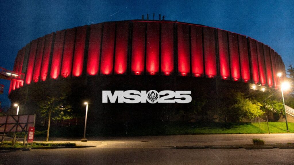 Pacific Coliseum in Vancouver illuminated in red with MSI 2025 logo projected on the building