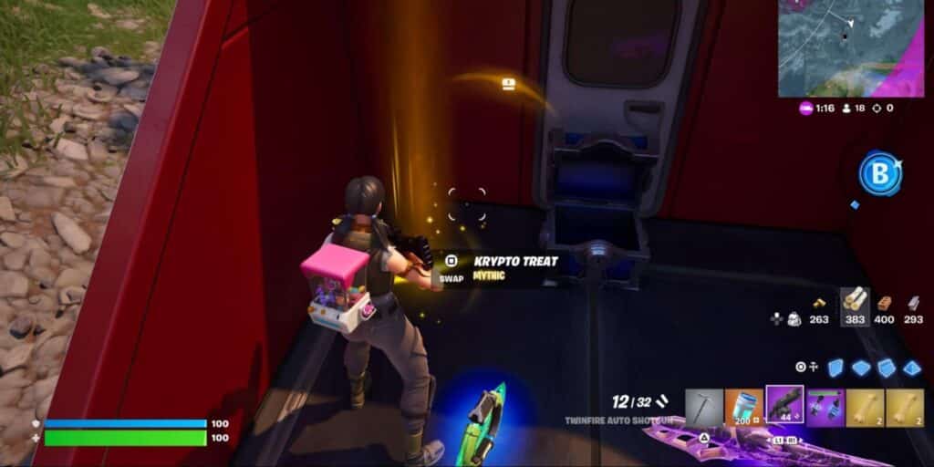 Fortnite player character about to pick up a Mythic Krypto Treat item inside a red train car, with glowing orange light highlighting the item