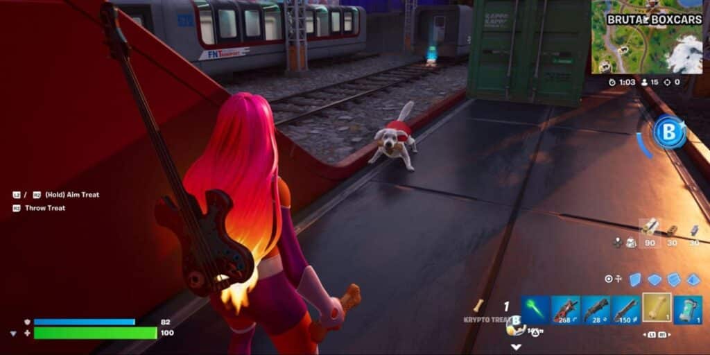 Fortnite character holding a Krypto Treat as Krypto the Superdog appears nearby in a red cape, responding to the thrown item near train tracks