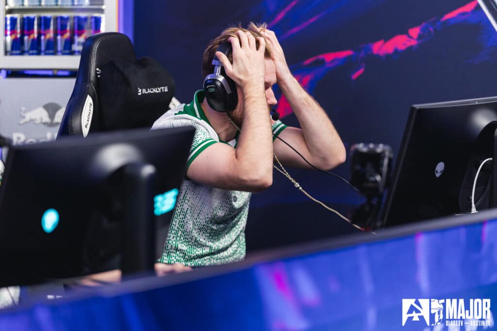 Image of Team Falcons Niko holding head in hands at BLAST Austin Major