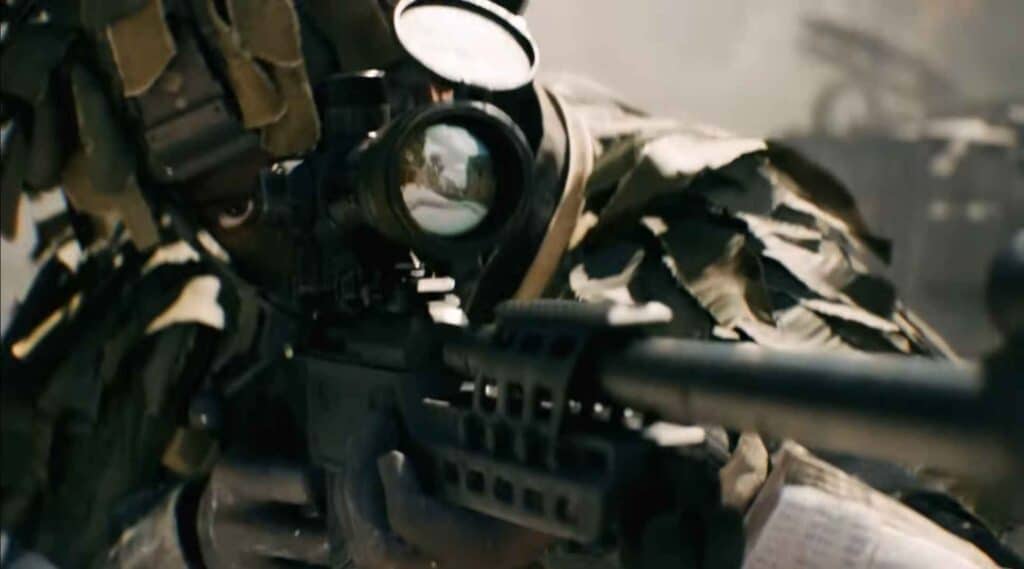 A soldier from Battlefield 6 in camouflage aims a scoped rifle, focused intently, with a blurred background, portraying a tense combat scene.