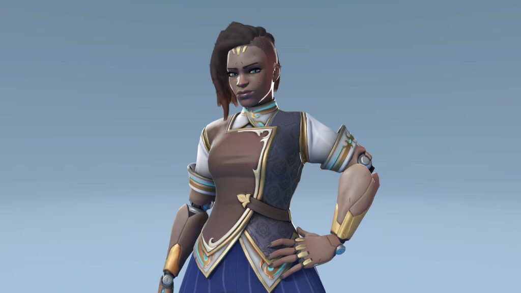 Sojourn with robotic arms, wearing traditional clothing with intricate designs, posed against a light blue background.
