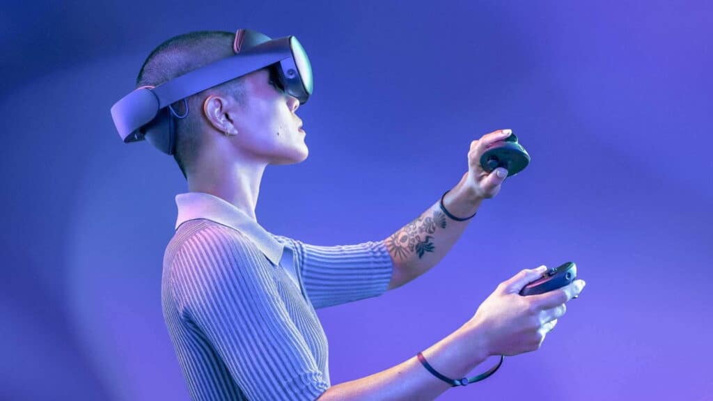 A person wearing a virtual reality headset and using controllers, set against a purple background. 
