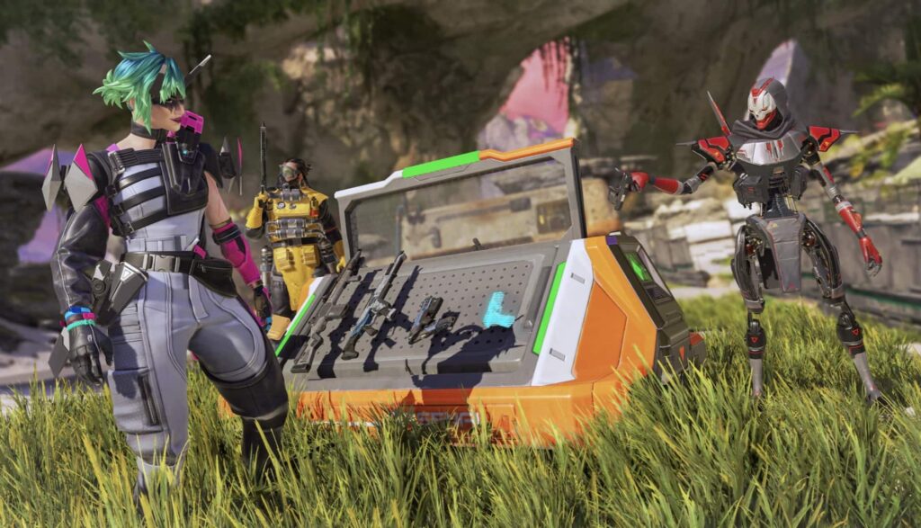 Three futuristic characters in vibrant attire stand around an open weapons crate in a grassy, lush landscape