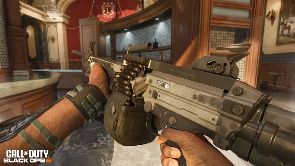 A close-up of a player holding a detailed military-style assault rifle in a luxurious interior setting from Call of Duty: Black Ops 6