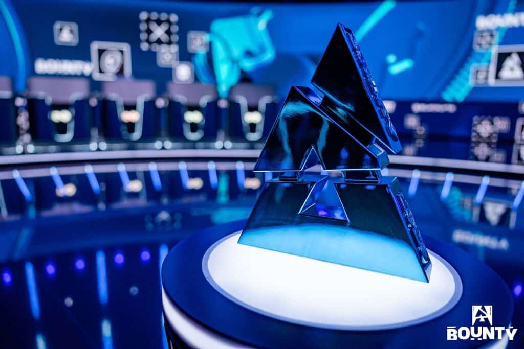 Image of BLAST Bounty trophy on a illuminated table with the stage in the background