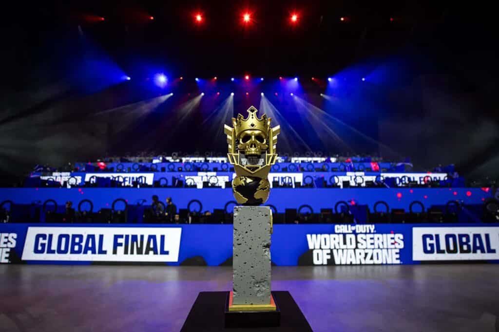 Image of World Series of Warzone trophy in front of the playing stations
