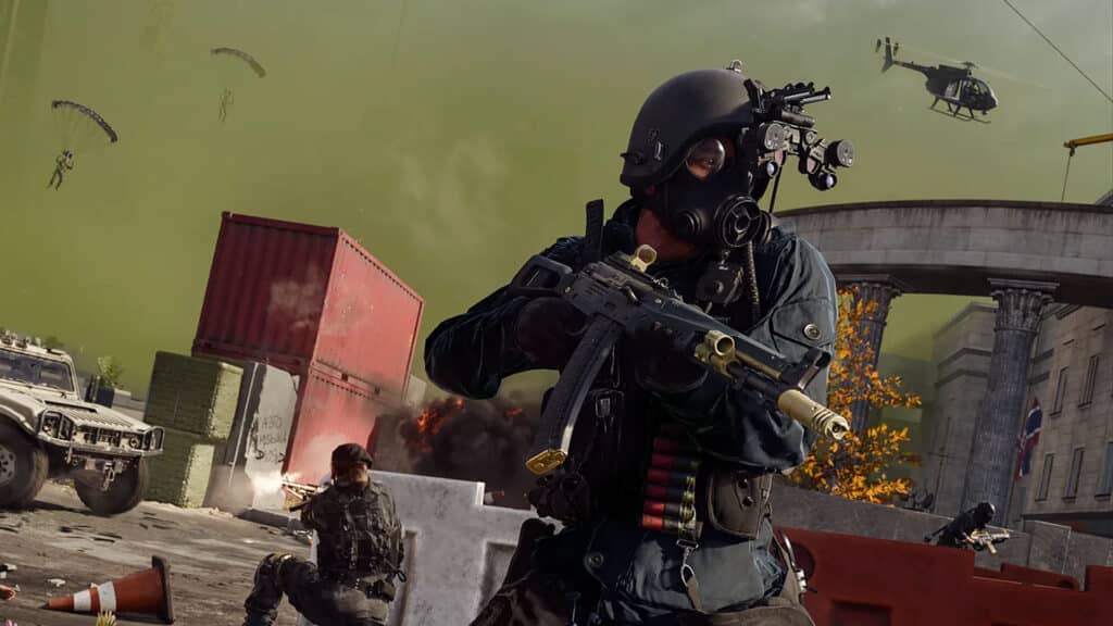 Image of Call of Duty Warzone player wearing headgear and holding a black and gold assault rifle