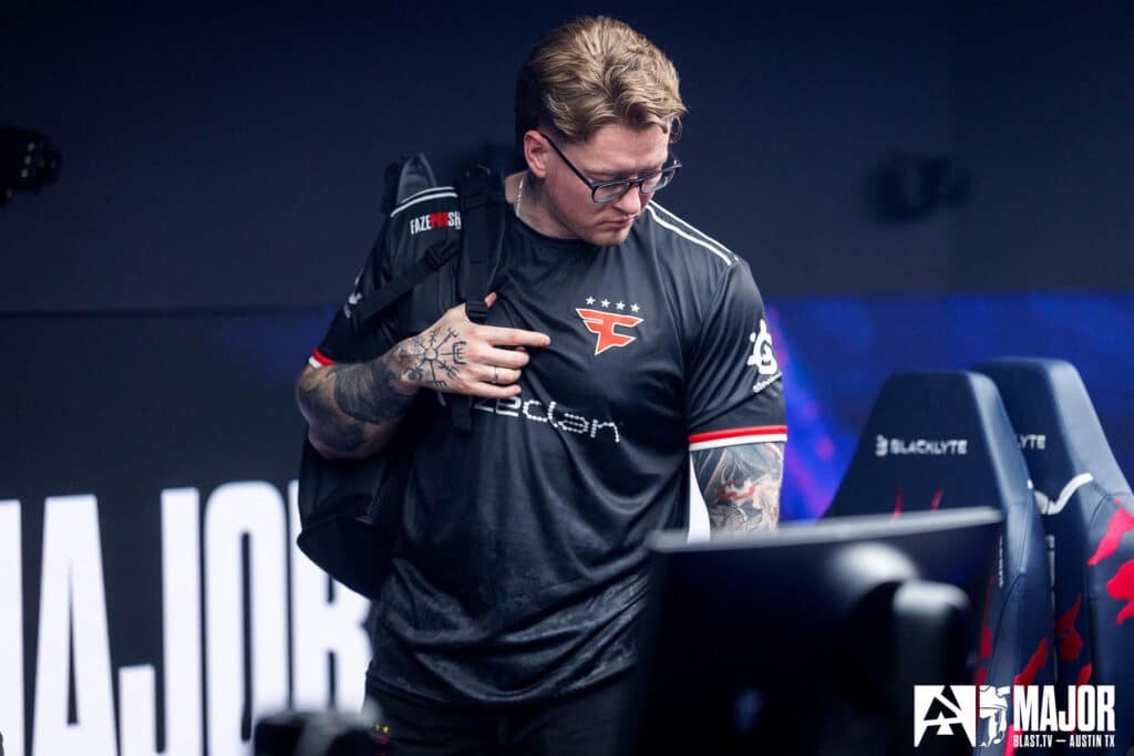 Image of Counter-Strike player rain wearing FaZe Clan jersey while carrying backpack while on stage at BLAST Austin Major