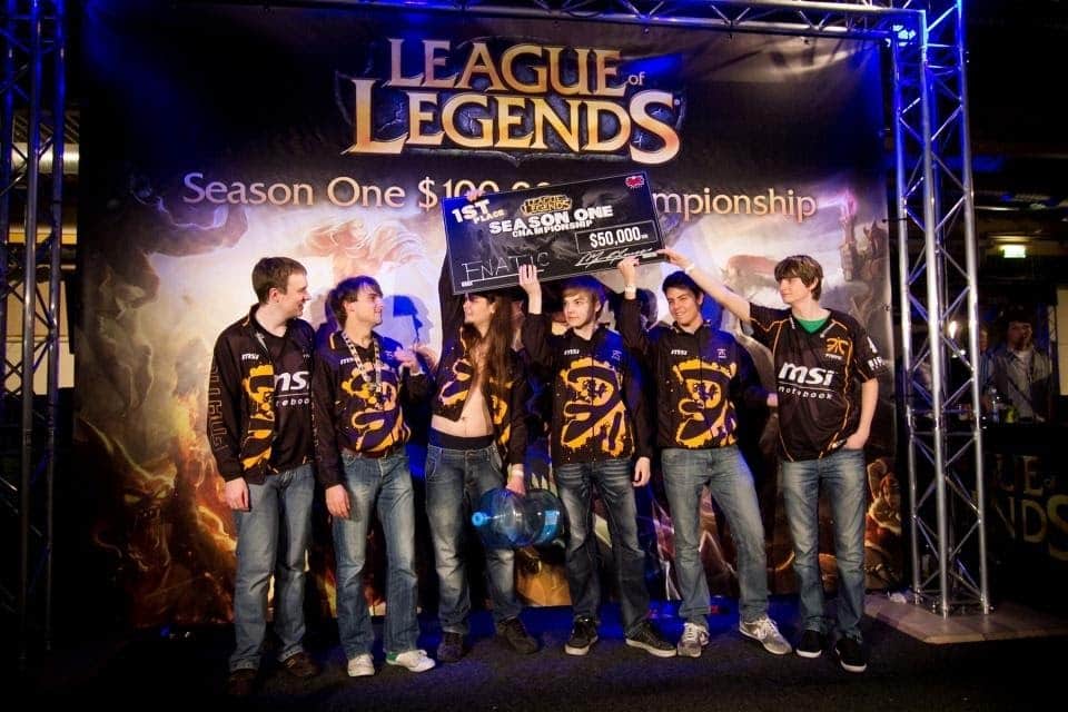 The Fnatic holding a $50,000 check