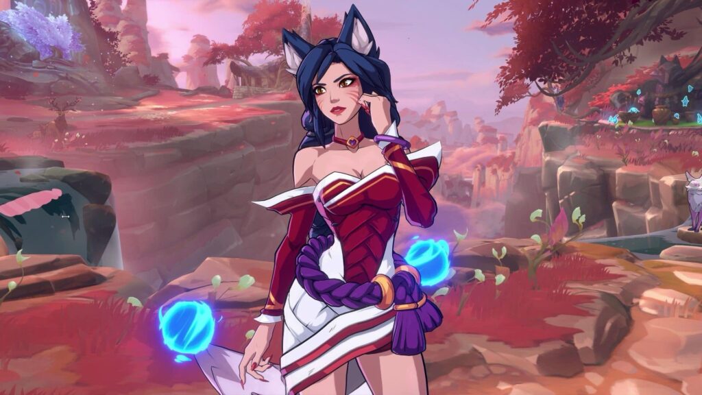 Ahri poses gracefully with her glowing orbs of magic in 2XKO