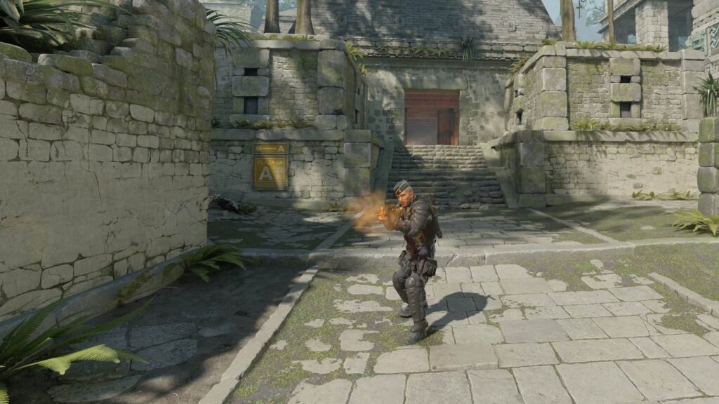 A Counter-Terrorist fires near the A site on the Ancient map in Counter-Strike 2