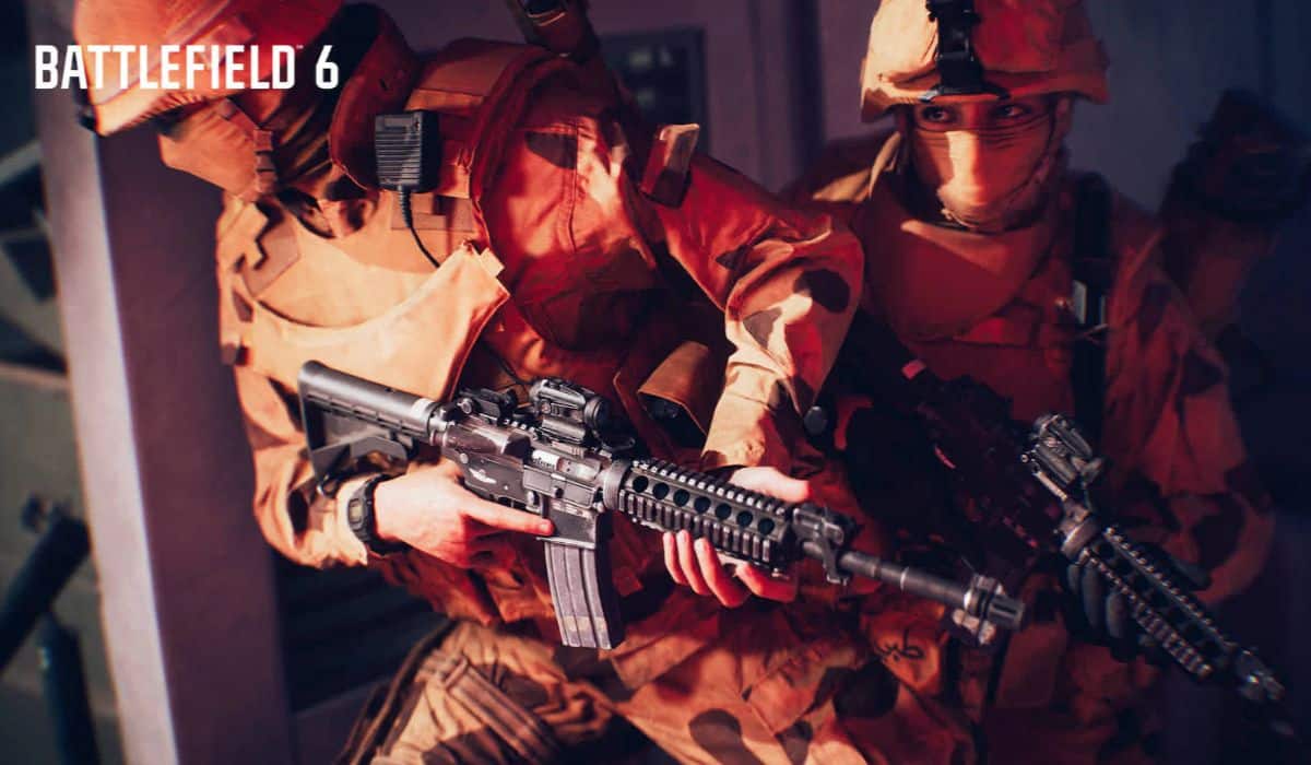 Battlefield 6 Assault soldiers preparing to breach a corridor with rifles ready for close-quarters combat.