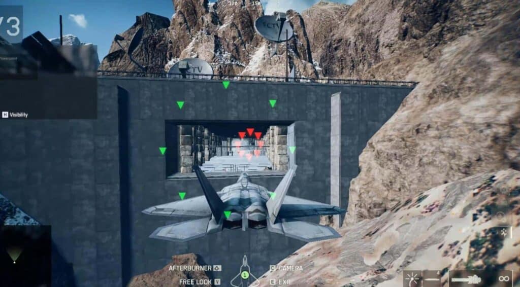 La scena del BF 6 con un aereo da caccia che vola in un tunnel attraverso una montagna rocciosa.