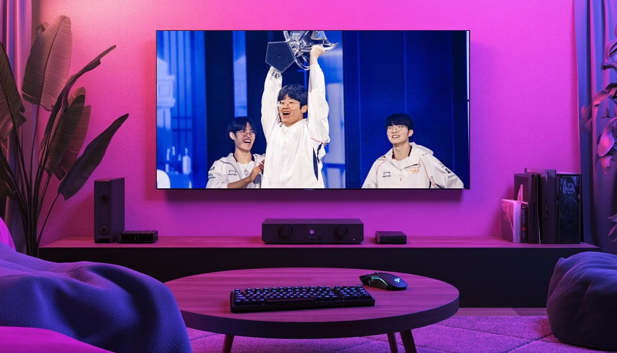 Large TV screen displays T1 team with trophy