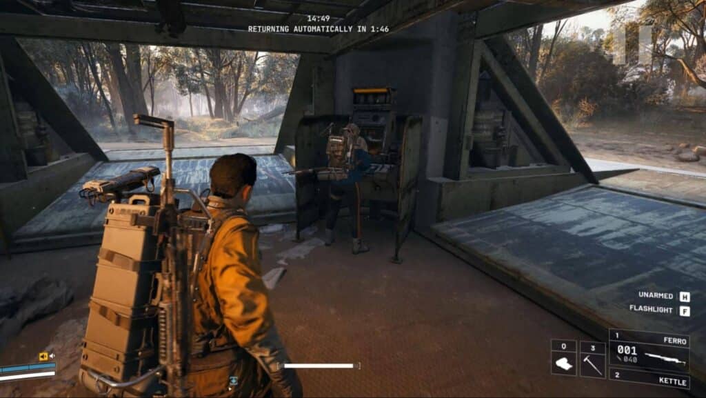 A character in tactical gear stands inside a metallic structure, facing another person sitting at a control panel in Arc Raiders