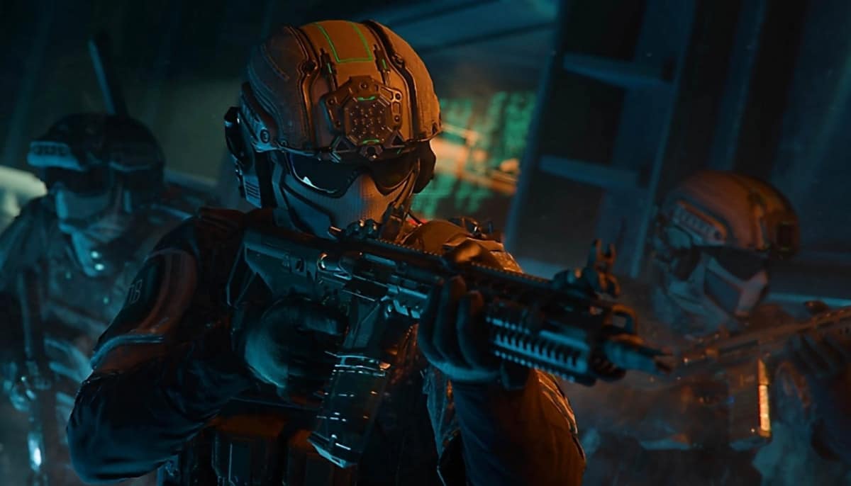 Three soldiers in futuristic armor and helmets aim rifles in a dimly lit, high-tech environment in Black Ops 7