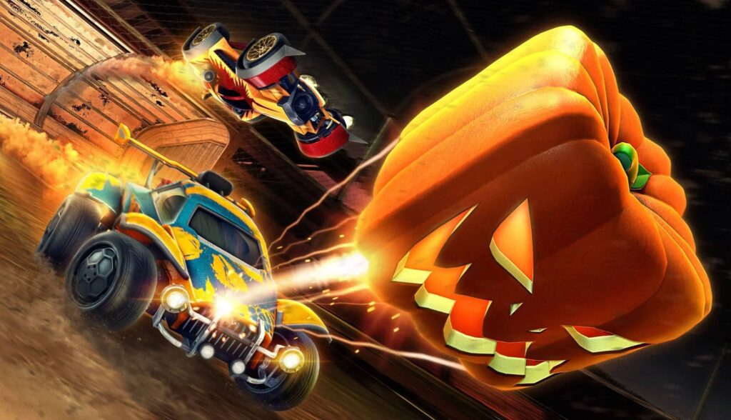 Rocket League cars playing with a giant pumpkin ball during the Haunted Hallows Halloween event