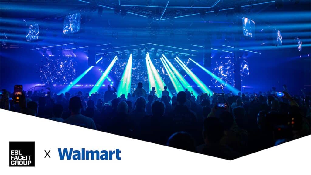 Image of DreamHack crowd standing in front of stage illuminated by blue lighting. The ESL FACEIT Group and Walmart logos are at the bottom left corner of the image