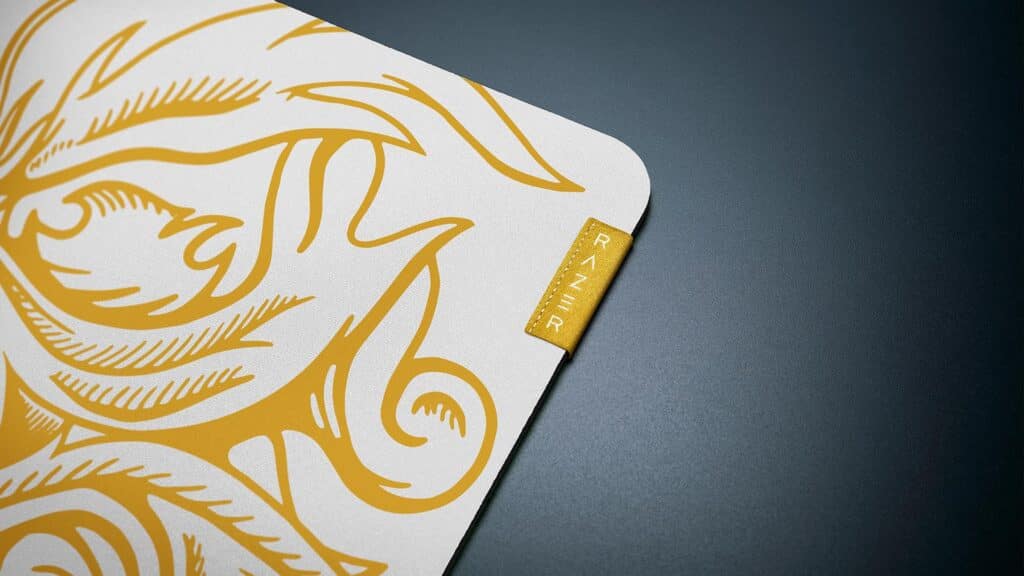 Image of Razer Gigantus V2 Faker Edition mouse mat on a black and grey background. The Razer logo is in the centre of the image on the edge of the mouse mat