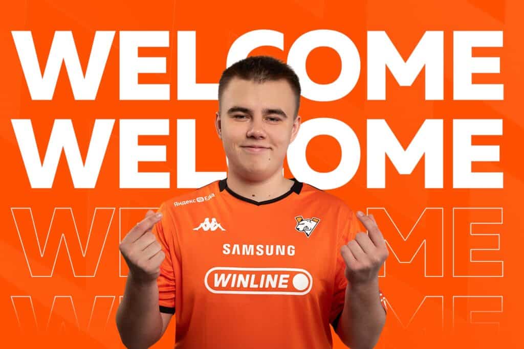 Image of Virtus.pro Counter-Strike player b1st posing while wearing a Virtus.pro jersey