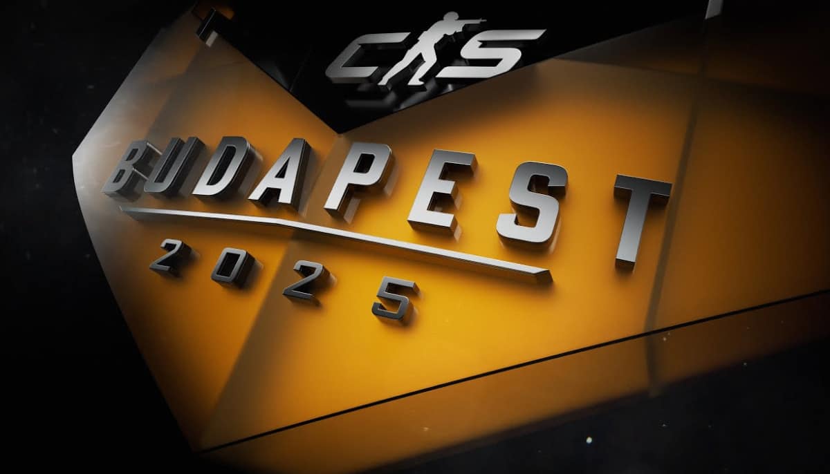 Futuristic design featuring raised silver letters spelling 'BUDAPEST 2025' on glowing orange background, topped by a gaming logo