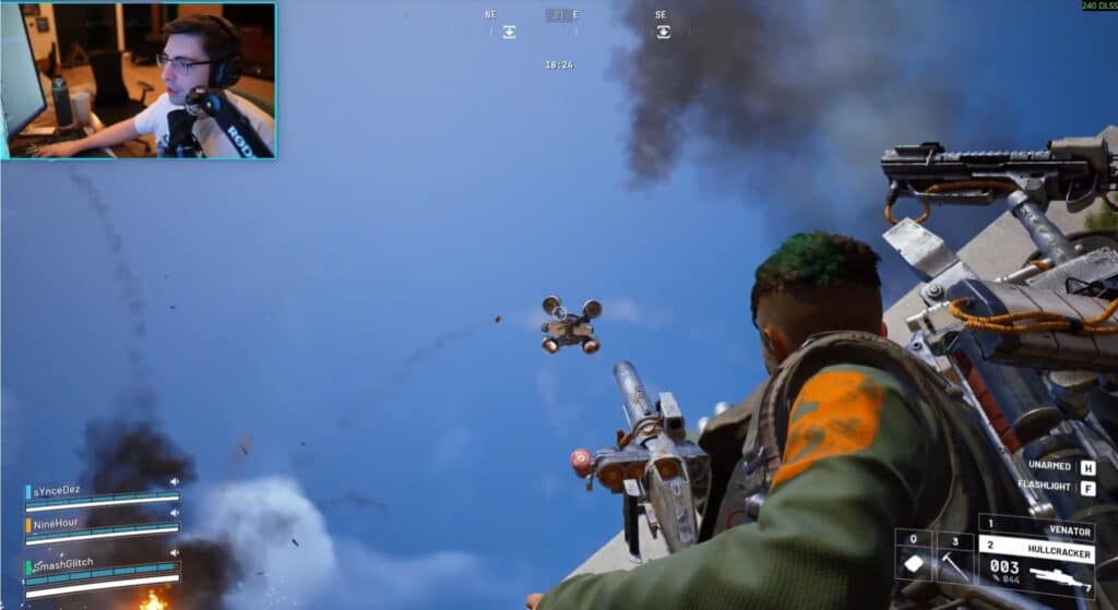 Ein Spieler streamt live und wird in einem Webcam-Overlay gezeigt, wie er Arc Raiders spielt