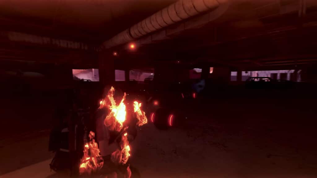 A dimly lit parking garage with a figure engulfed in flames, emitting an intense, fiery glow in Arc Raiders