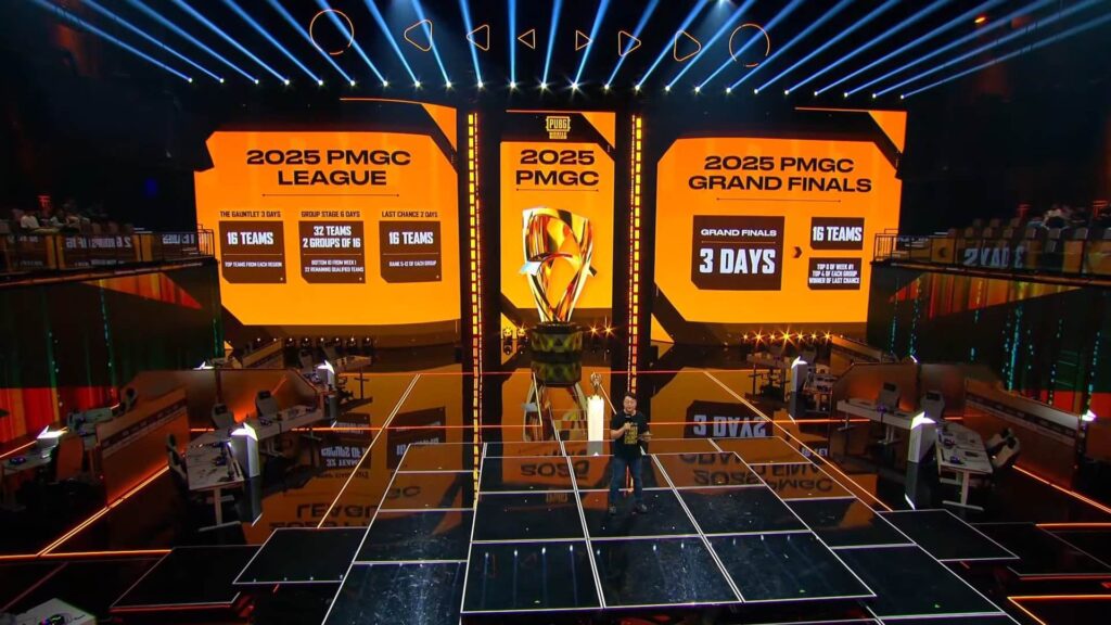 Bühnenaufbau für das PMGC-E-Sport-Event 2025 mit hellen Bildschirmen, auf denen Turnierdetails angezeigt werden