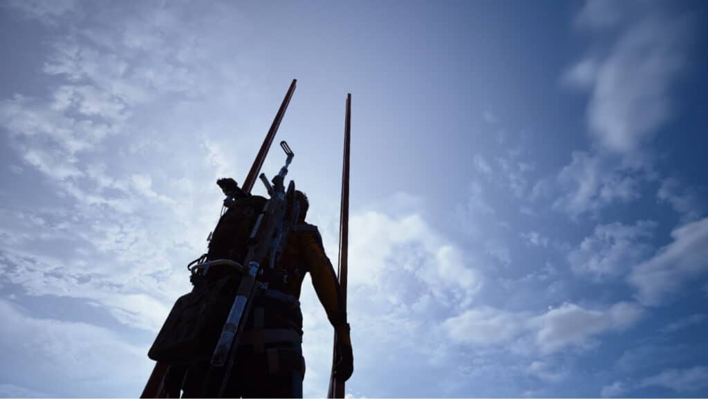 Silhouette einer Person mit Skistöcken vor einem leuchtend blauen, teilweise bewölkten Himmel in Arc Raiders