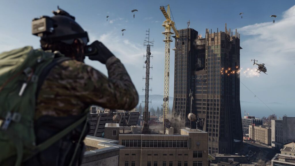 A soldier scouting a city skyline as helicopters and parachuting players engage in Warzone