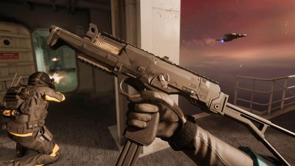 First-person view of a futuristic firearm being held, with a soldier crouching and firing in a dimly lit hallway in Black Ops 7