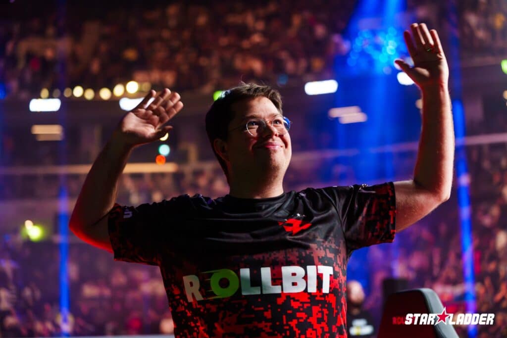 Image of FaZe Clan Counter-Strike player Karrigan smiling with hands raised at StarLadder Budapest Major 2025